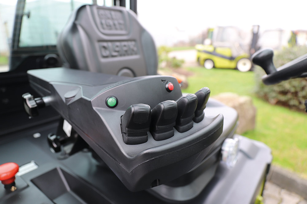 Armrest with integrated mini levers Armrest with integrated mini levers